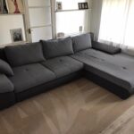 This is a photo of a grey L shape sofa that has been professionally steam cleaned, also the beige carpets have been steam cleaned too works carried out by Haggerston Carpet Cleaning